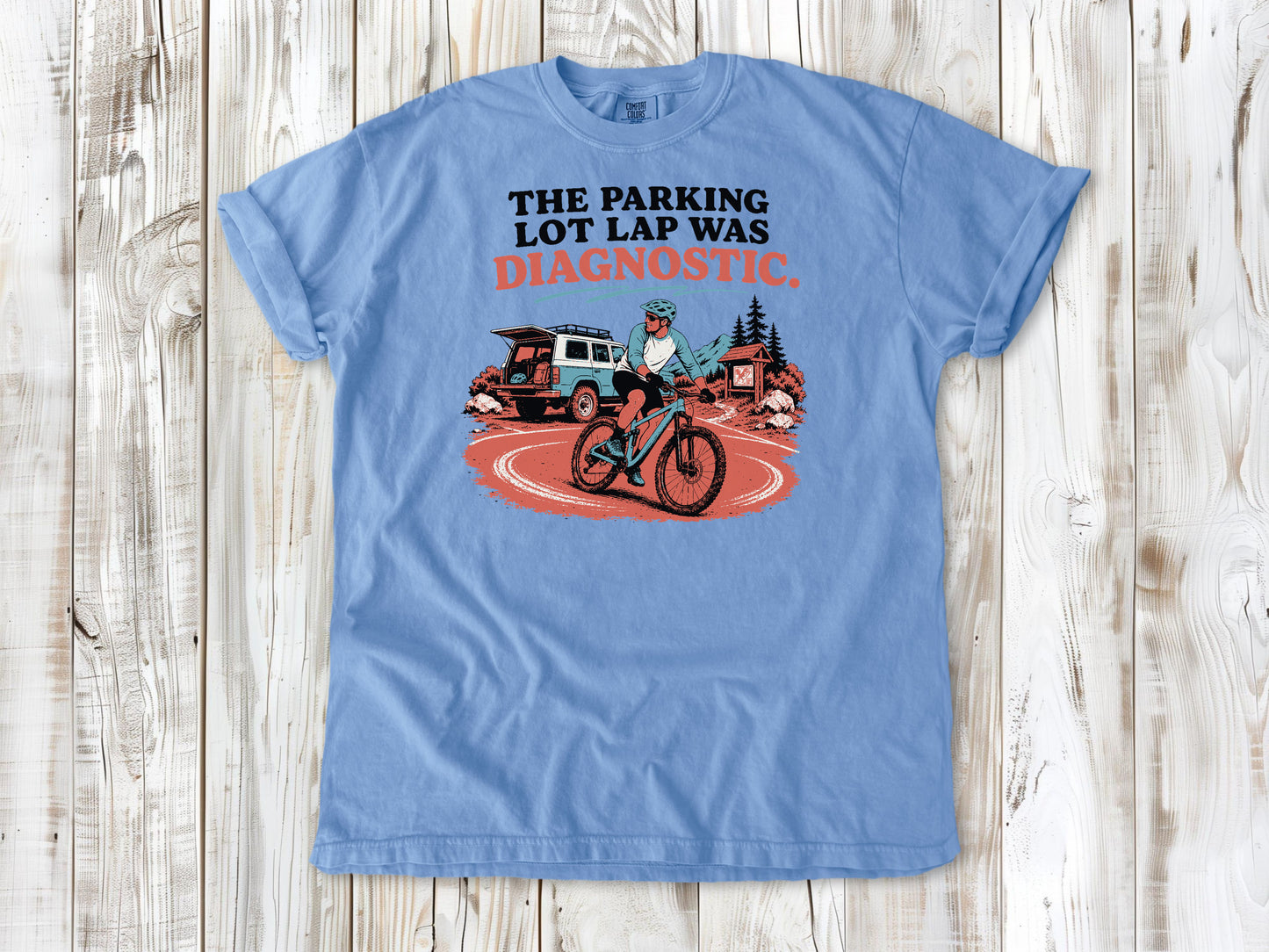 Pepper garment-dyed tee with The Parking Lot Lap Was Diagnostic mountain biking graphic.