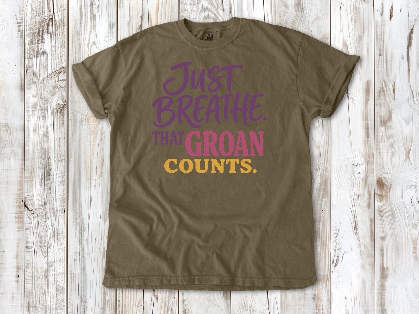 Graphite garment-dyed tee with Just Breathe That Groan Counts yoga graphic.