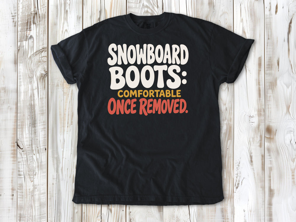 Washed Denim garment-dyed tee with Snowboard Boots Comfortable Once Removed graphic.
