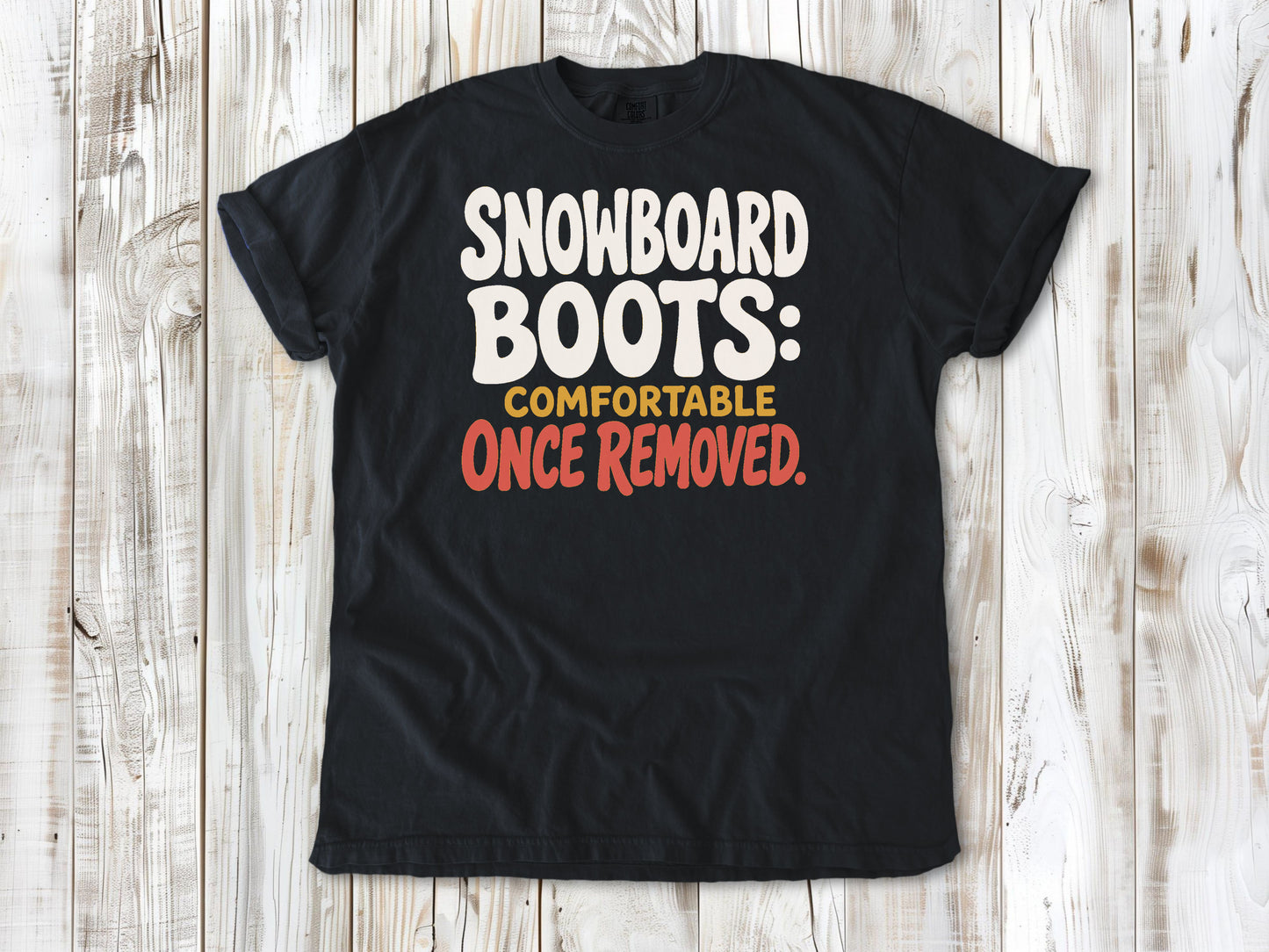 Washed Denim garment-dyed tee with Snowboard Boots Comfortable Once Removed graphic.