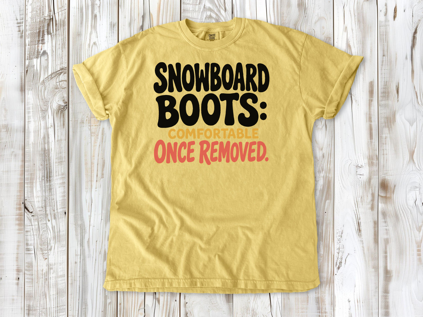 Grey garment-dyed tee with Snowboard Boots Comfortable Once Removed graphic.
