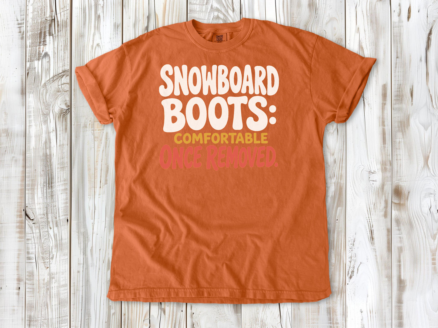Seafoam garment-dyed tee with Snowboard Boots Comfortable Once Removed graphic.