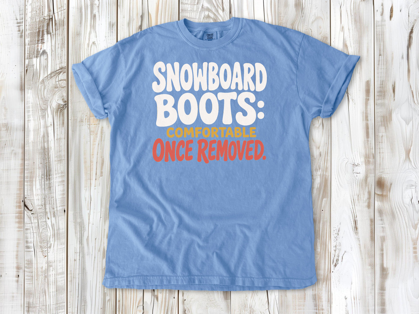 Pepper garment-dyed tee with Snowboard Boots Comfortable Once Removed graphic.