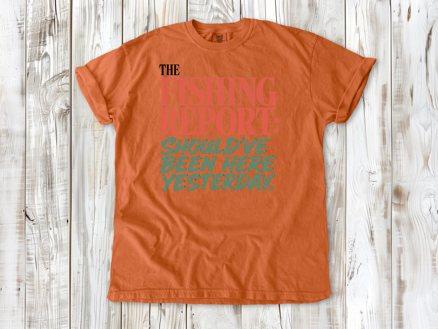 Seafoam garment-dyed tee with The Fishing Report Should've Been Here Yesterday graphic.