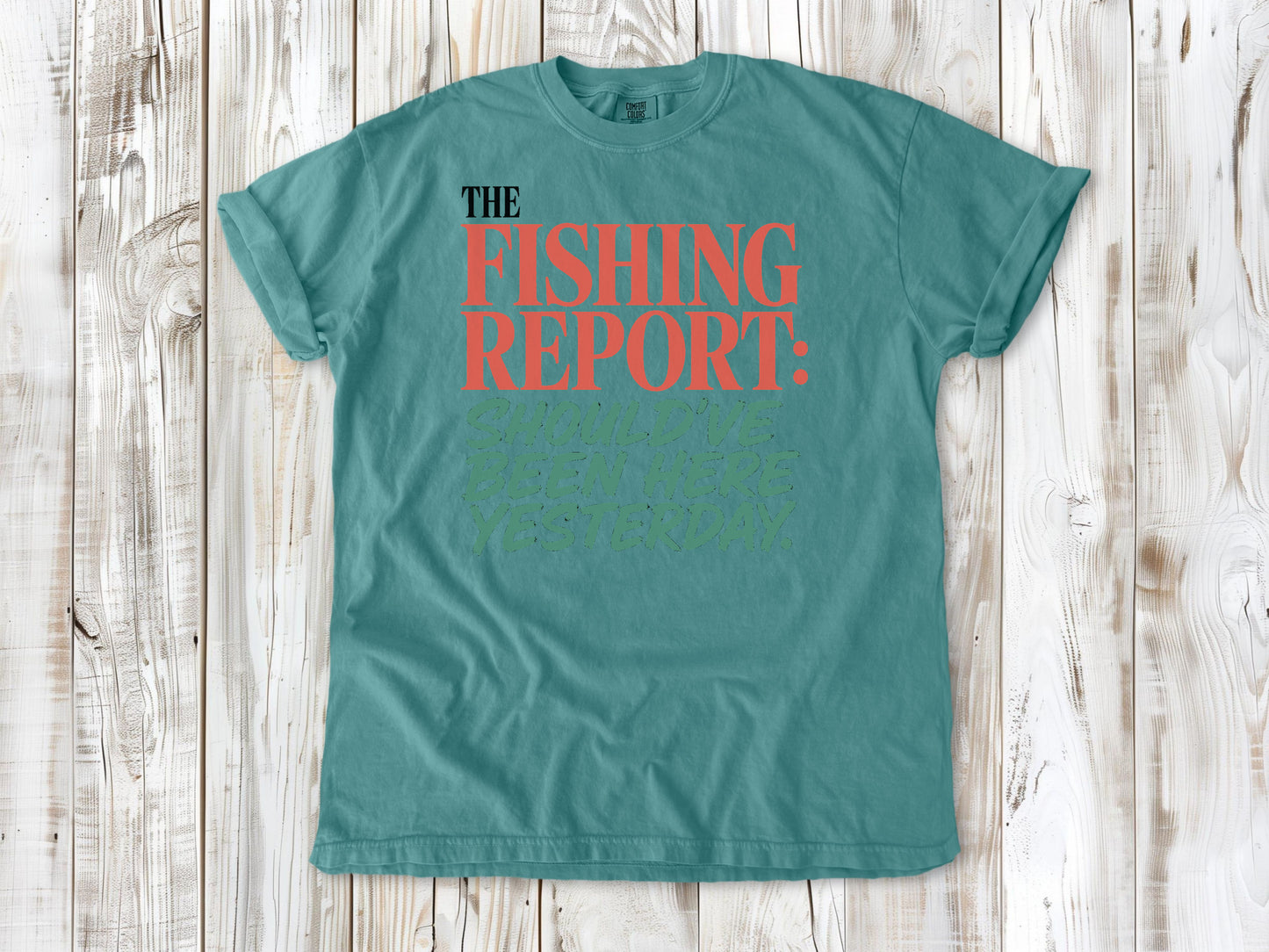 Mustard garment-dyed tee with The Fishing Report Should've Been Here Yesterday graphic.