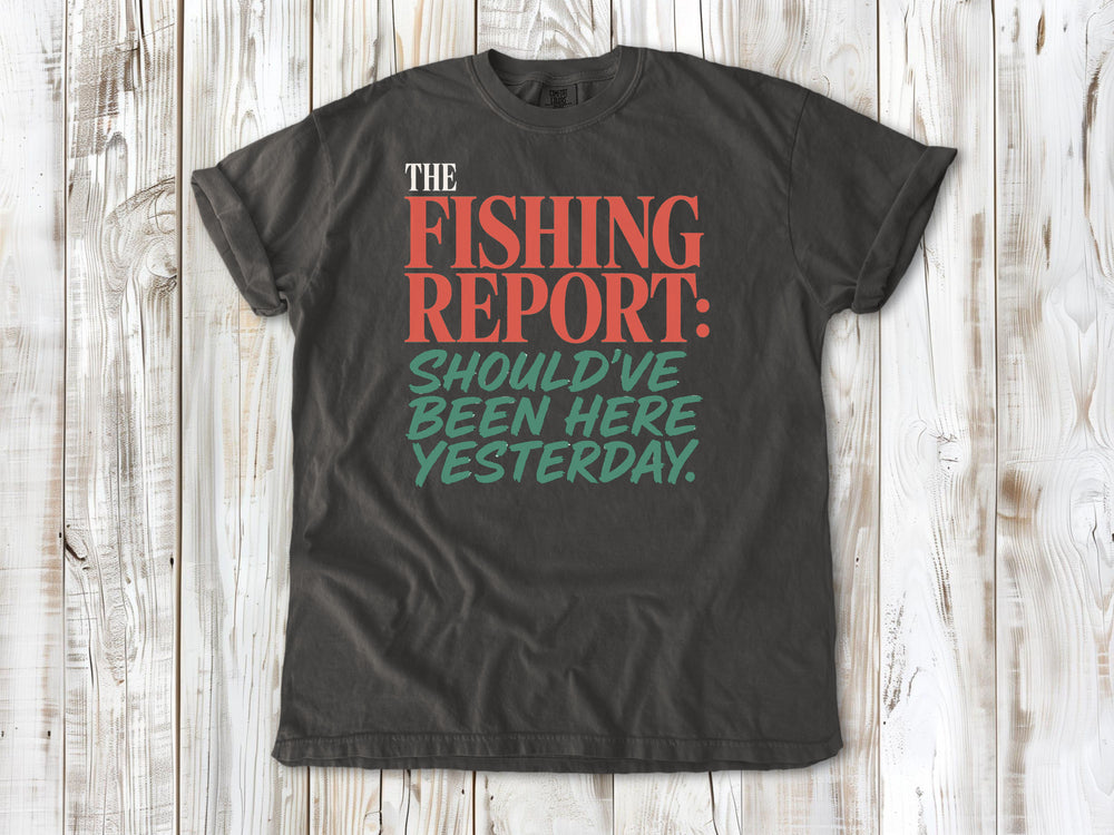 Ivory garment-dyed tee with The Fishing Report Should've Been Here Yesterday graphic.