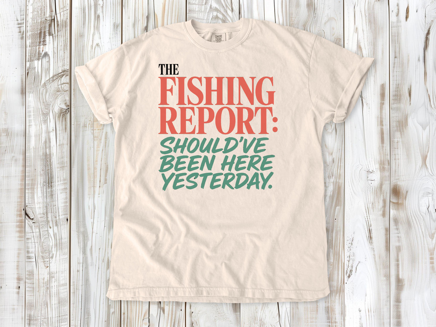 Butter garment-dyed tee with The Fishing Report Should've Been Here Yesterday graphic.