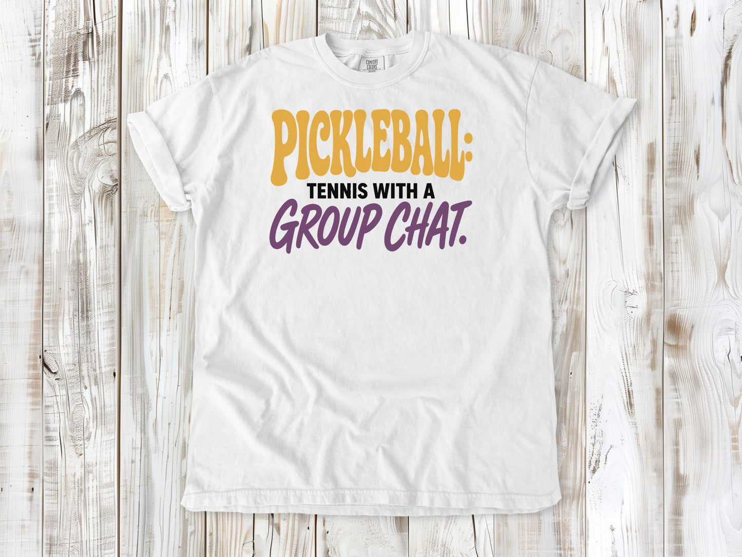White garment-dyed tee with Pickleball Tennis With a Group Chat graphic.