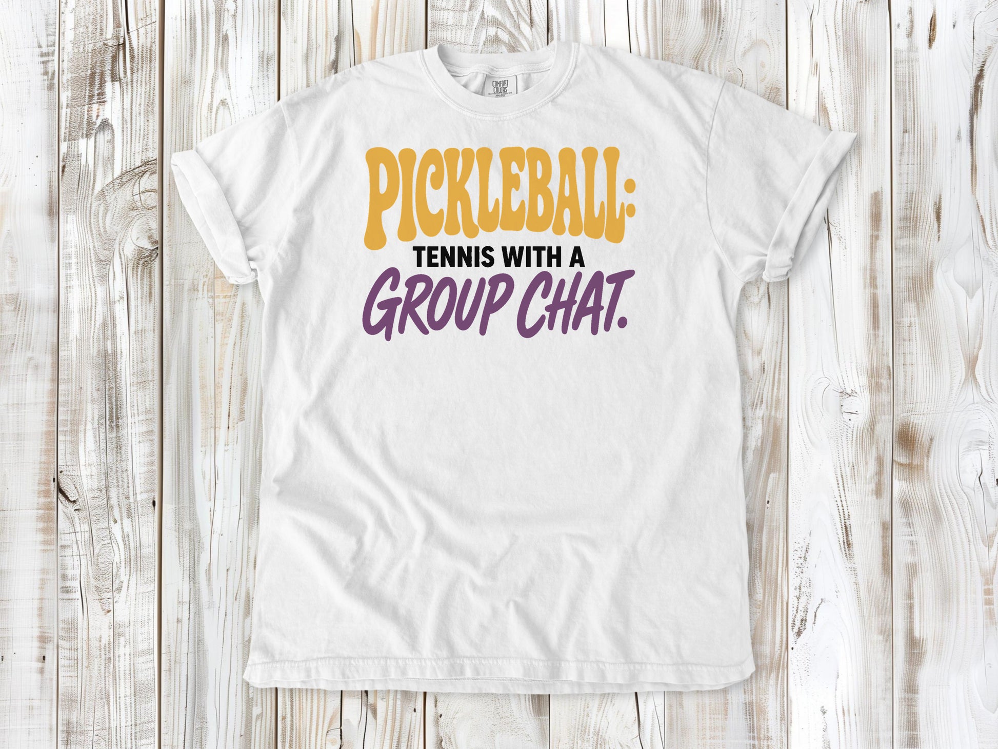White garment-dyed tee with Pickleball Tennis With a Group Chat graphic.