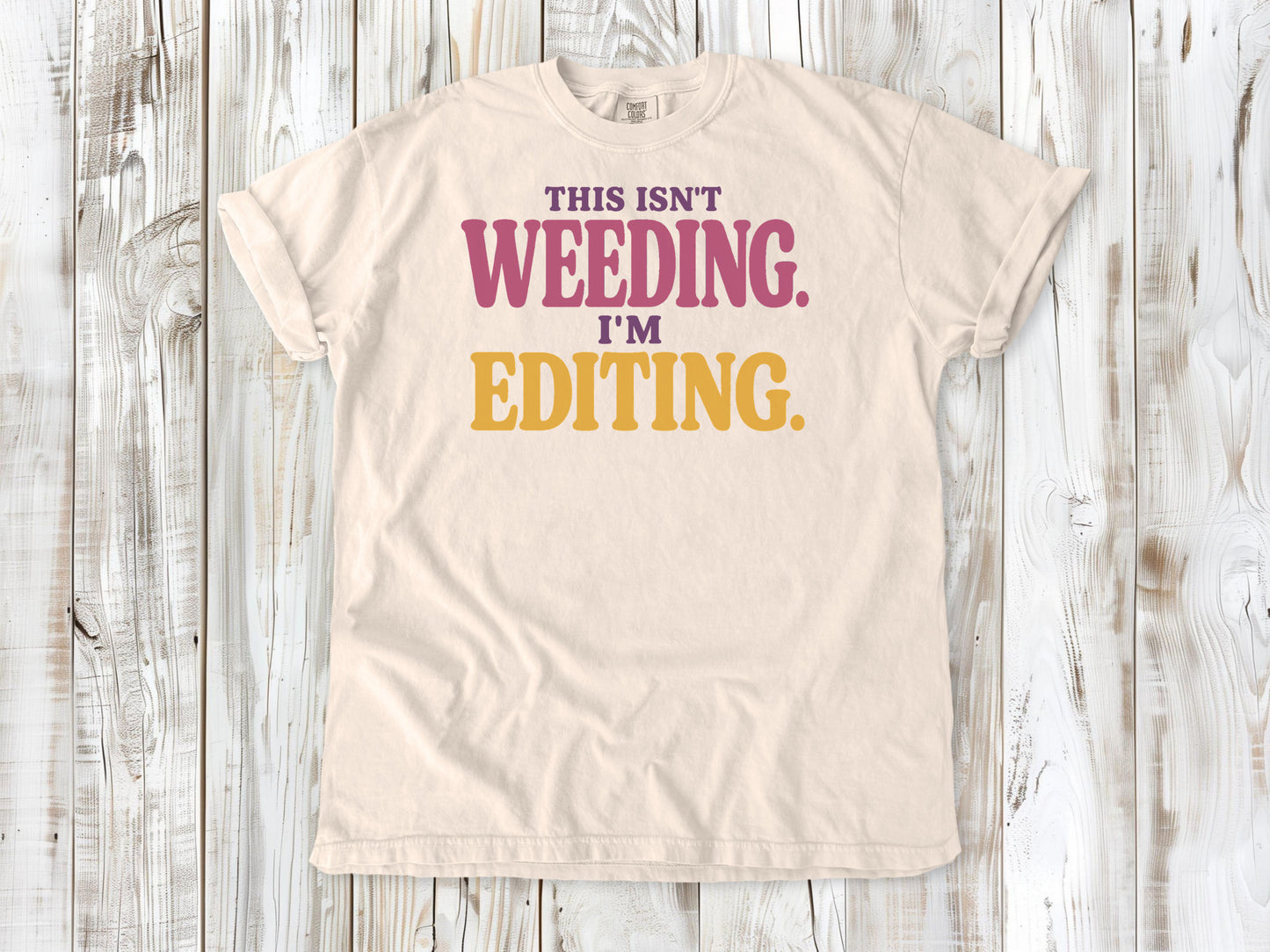 Butter garment-dyed tee with This Isn't Weeding I'm Editing gardening graphic.