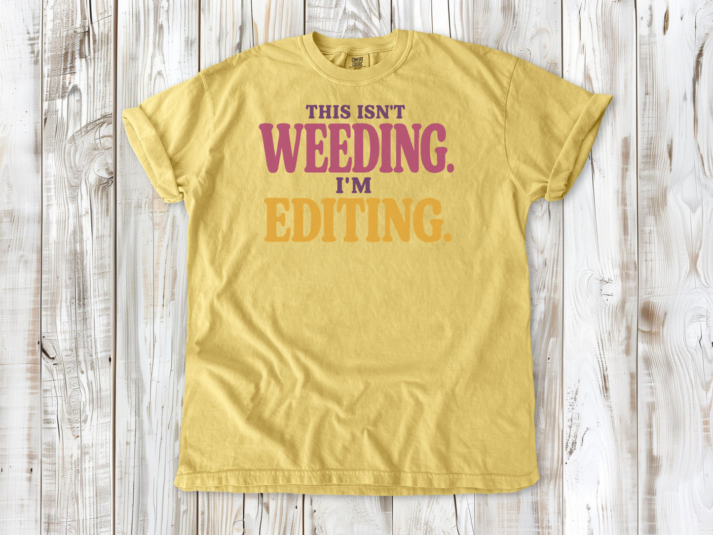 Grey garment-dyed tee with This Isn't Weeding I'm Editing gardening graphic.