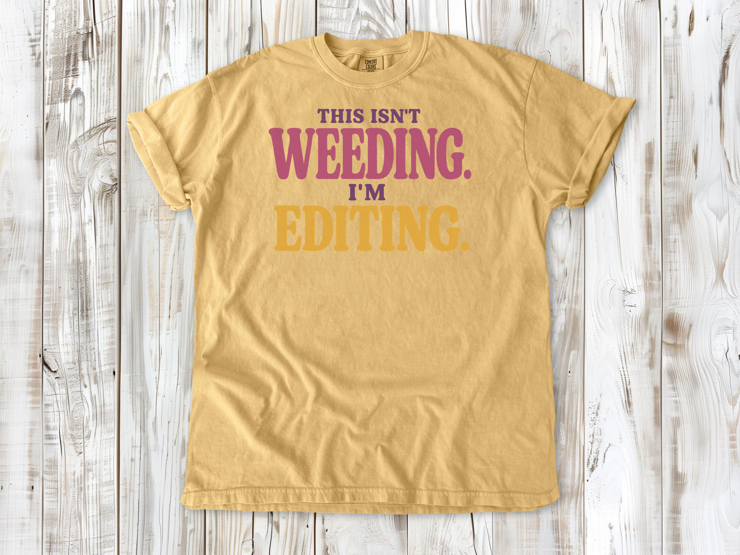 Burnt Orange garment-dyed tee with This Isn't Weeding I'm Editing gardening graphic.