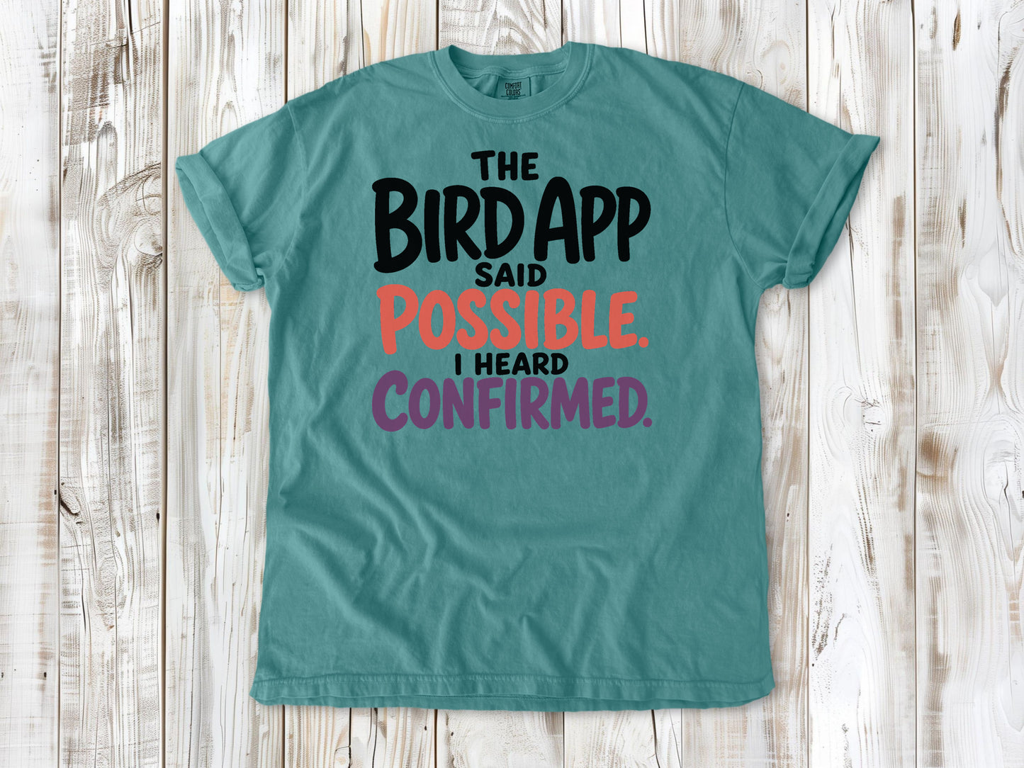 Mustard garment-dyed tee with The Bird App Said Possible I Heard Confirmed birding graphic.