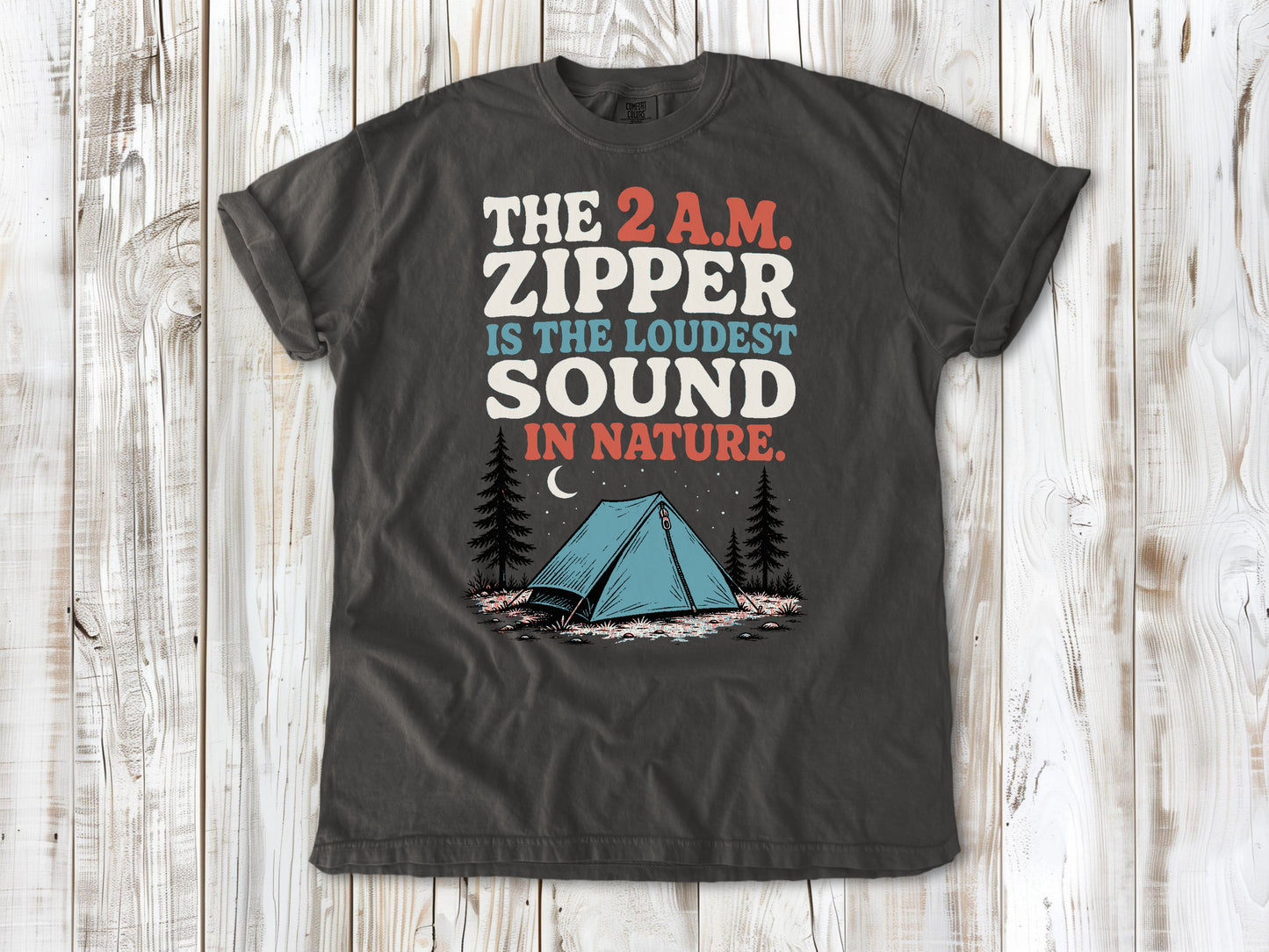 Ivory garment-dyed tee with The 2 A.M. Zipper Is the Loudest Sound in Nature camping graphic.