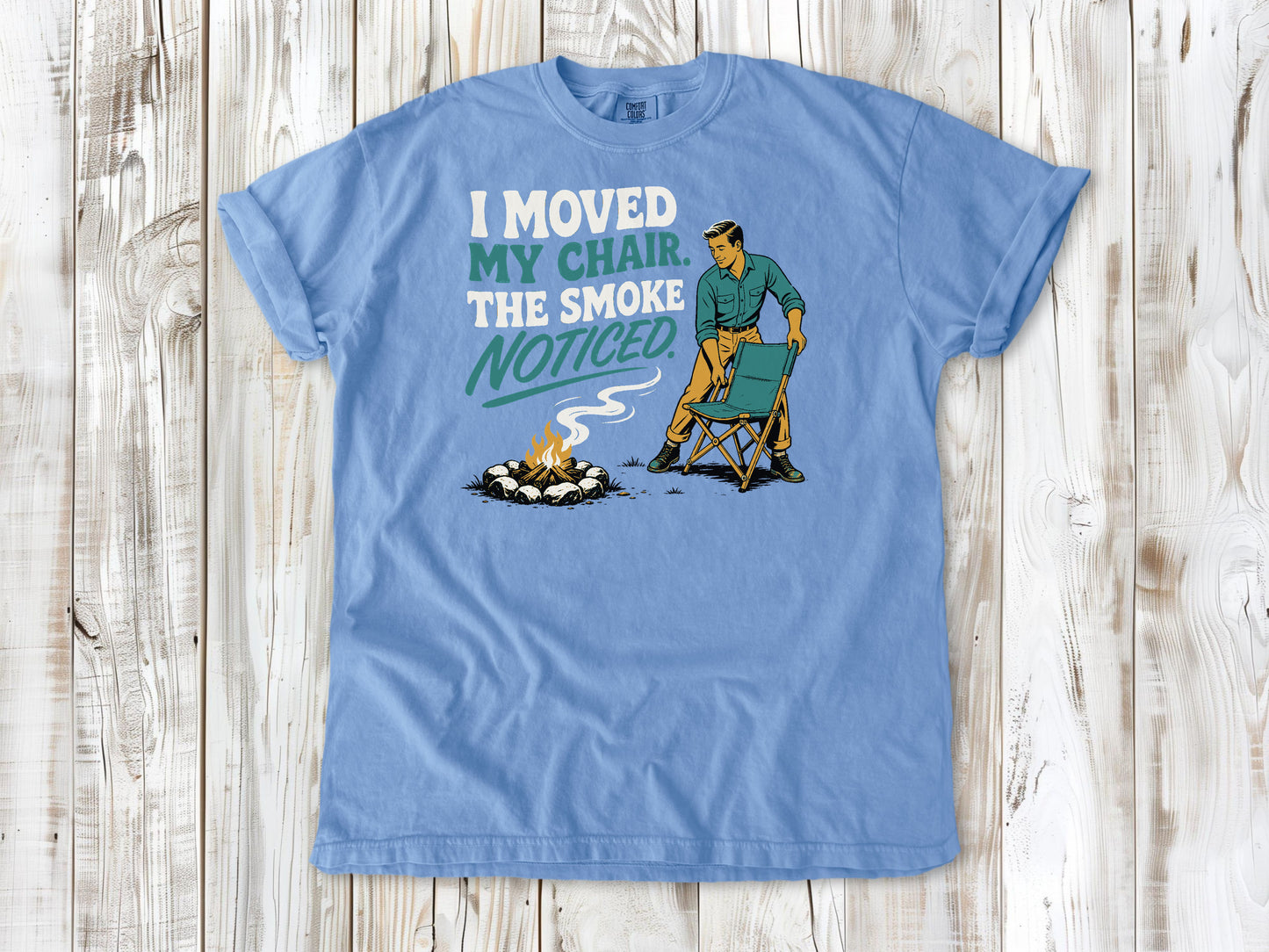 Pepper garment-dyed tee with I Moved My Chair The Smoke Noticed campfire graphic.