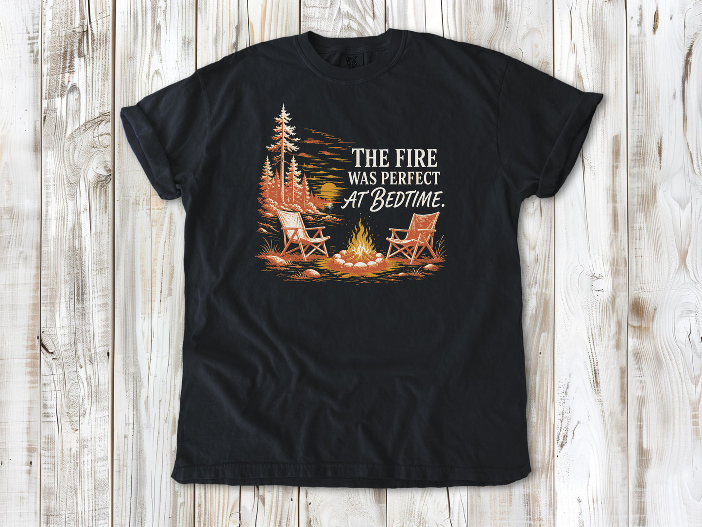 Washed Denim garment-dyed tee with The Fire Was Perfect at Bedtime campfire graphic.