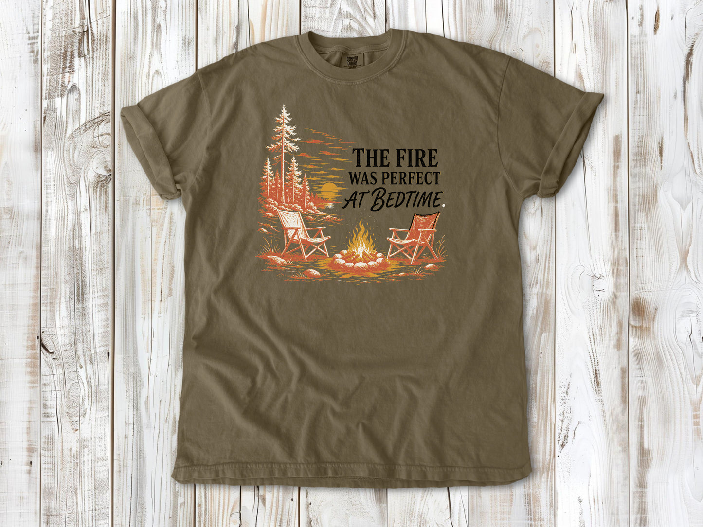 Graphite garment-dyed tee with The Fire Was Perfect at Bedtime campfire graphic.