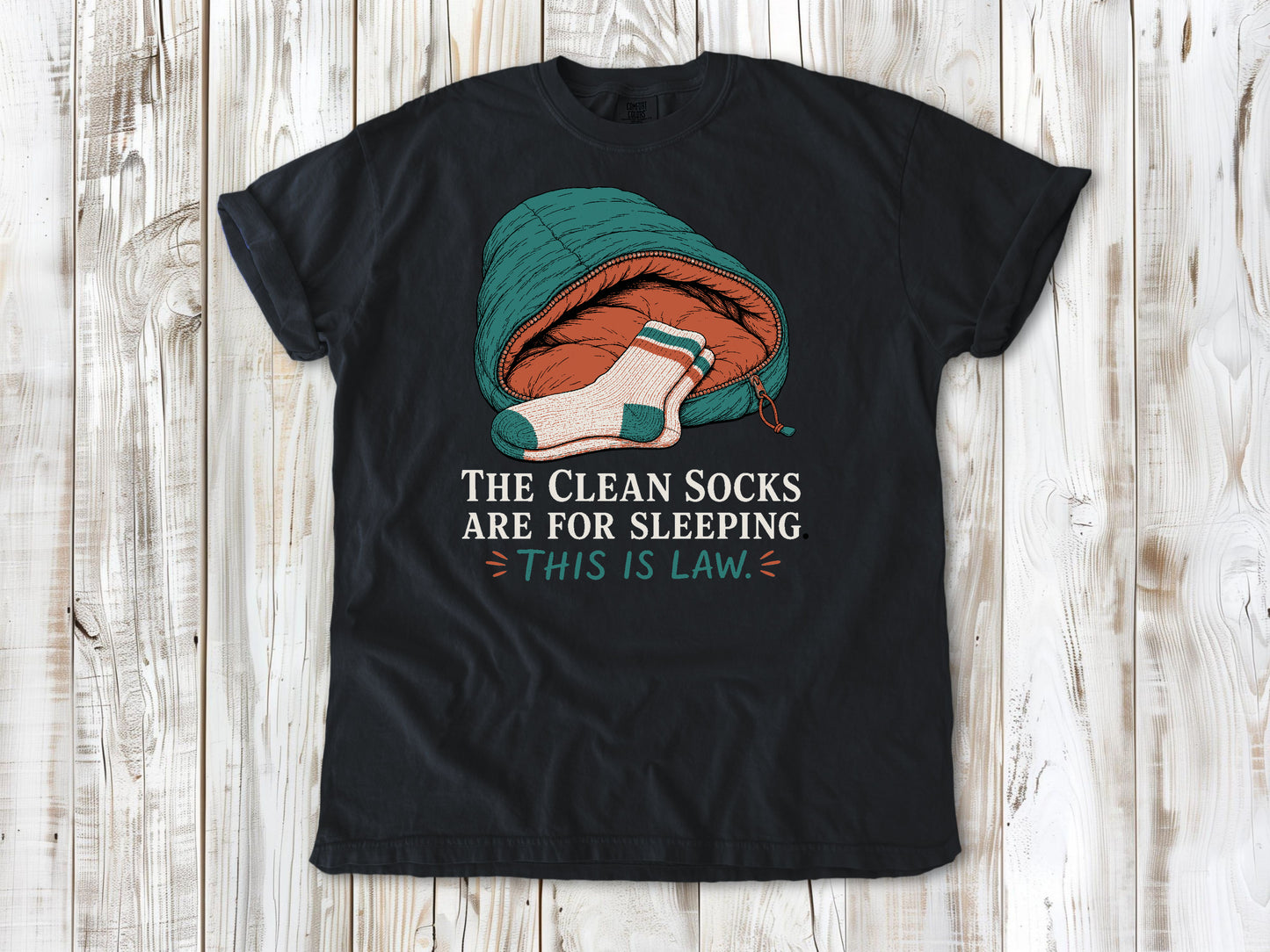 Washed Denim garment-dyed tee with The Clean Socks Are for Sleeping This Is Law camping graphic.