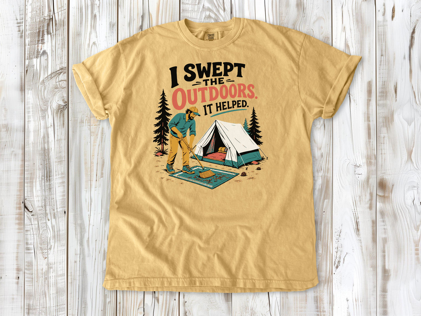 Burnt Orange garment-dyed tee with I Swept the Outdoors It Helped camping graphic.