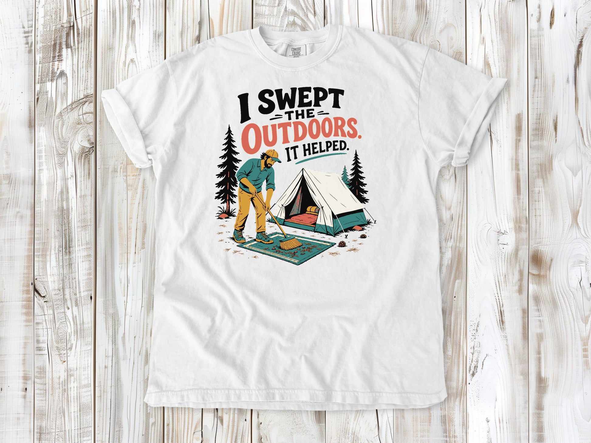 White garment-dyed tee with I Swept the Outdoors It Helped camping graphic.