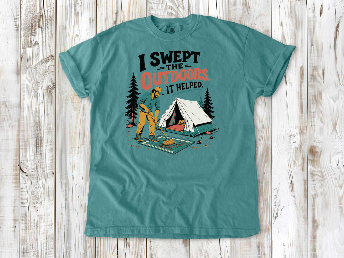 Mustard garment-dyed tee with I Swept the Outdoors It Helped camping graphic.