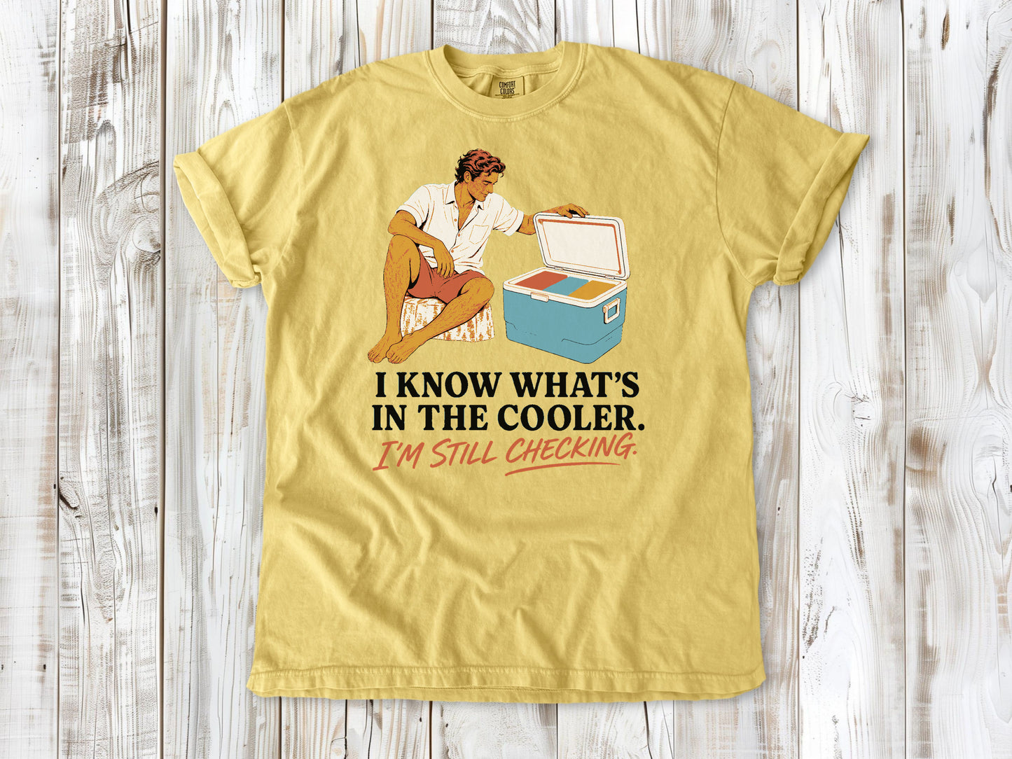 Grey garment-dyed tee with I Know What's in the Cooler I'm Still Checking beach graphic.