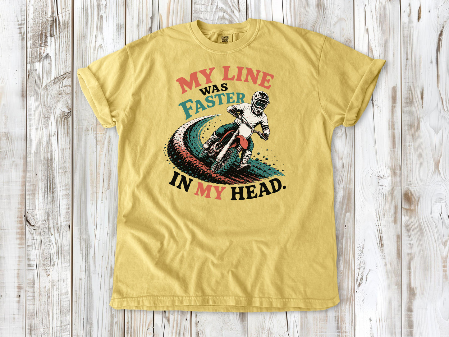 Butter garment-dyed tee with My Line Was Faster in My Head motocross rider graphic.