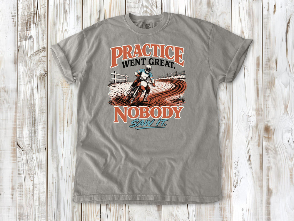 Grey garment-dyed tee with Practice Went Great Nobody Saw It motocross graphic.