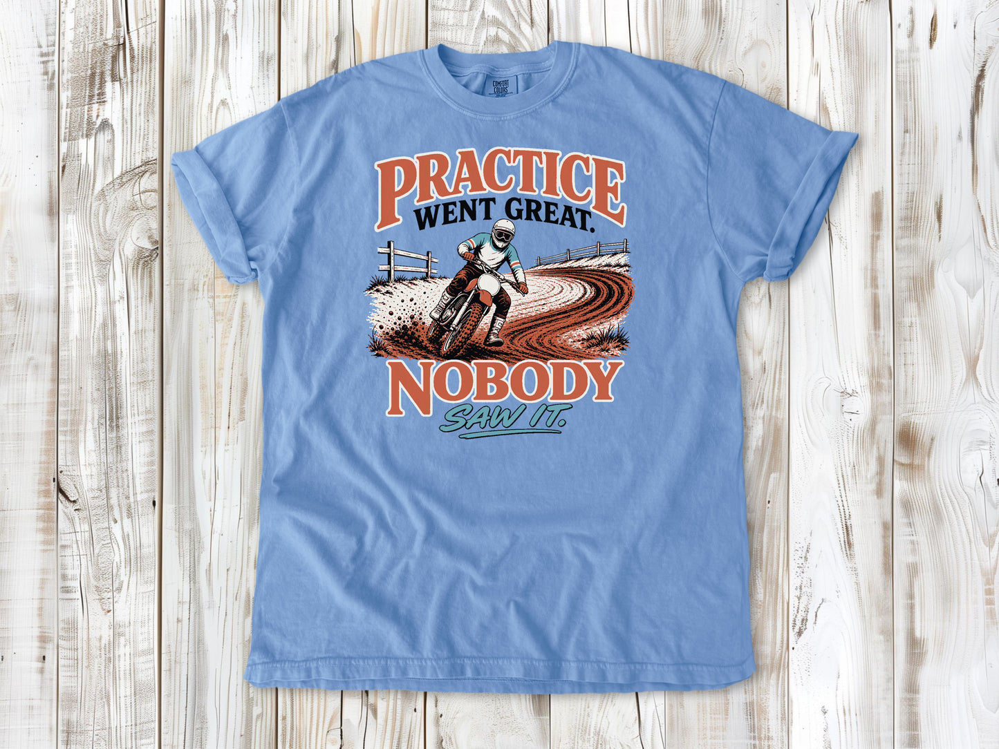 Washed Denim garment-dyed tee with Practice Went Great Nobody Saw It motocross graphic.