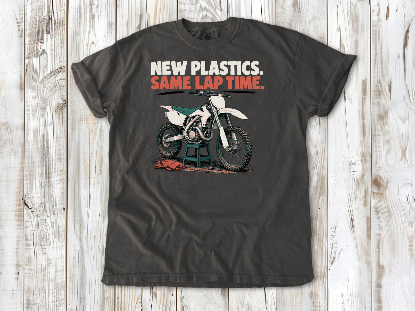 Pepper garment-dyed tee with New Plastics Same Lap Time dirt bike graphic.