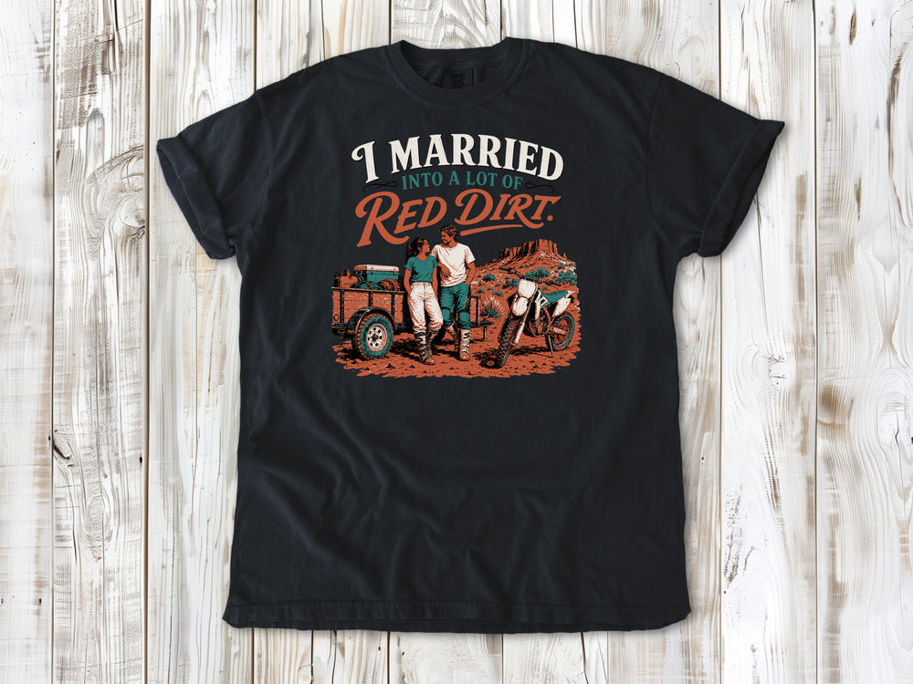 Graphite garment-dyed tee with I Married Into a Lot of Red Dirt motocross couple graphic.