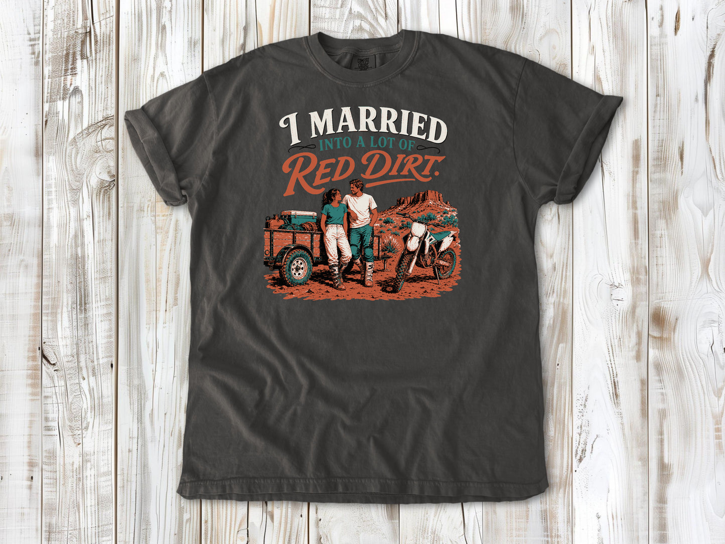 Pepper garment-dyed tee with I Married Into a Lot of Red Dirt motocross couple graphic.