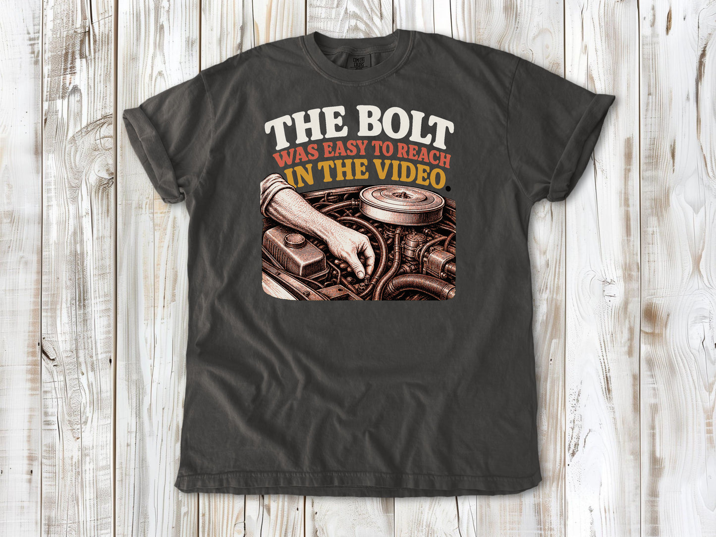Pepper garment-dyed tee with The Bolt Was Easy to Reach in the Video mechanic graphic.