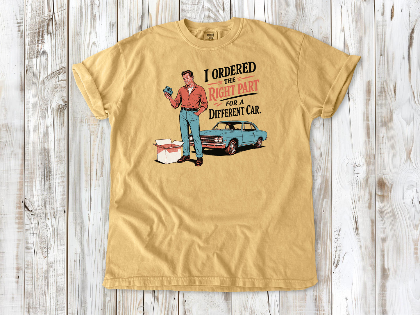 Mustard garment-dyed tee with The Right Part for a Different Car project car graphic.