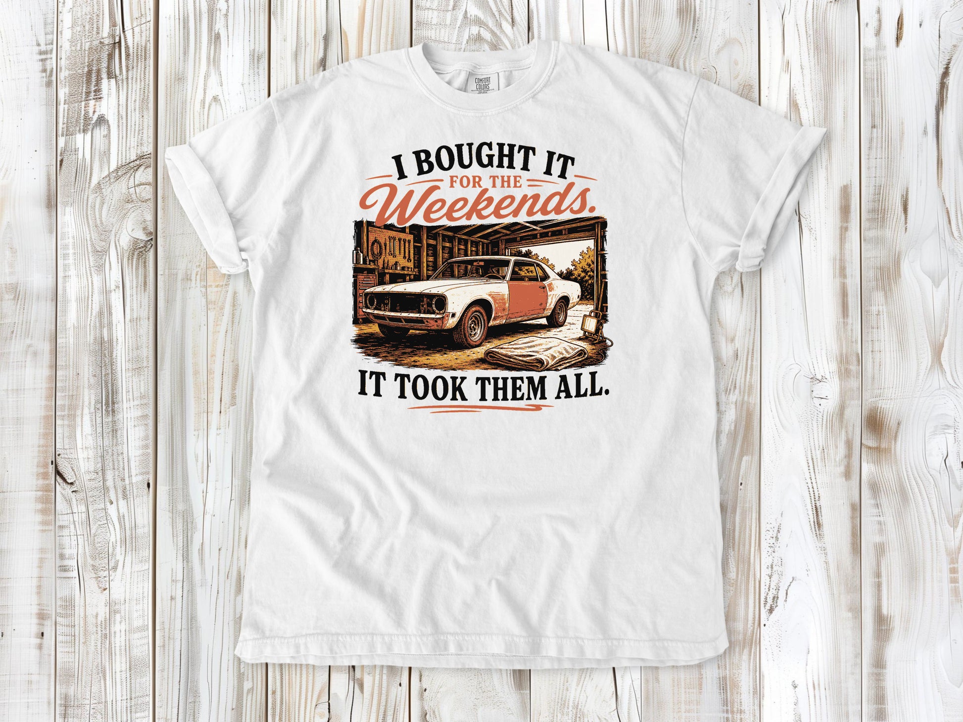 White garment-dyed tee with I Bought It for the Weekends It Took Them All project car graphic.