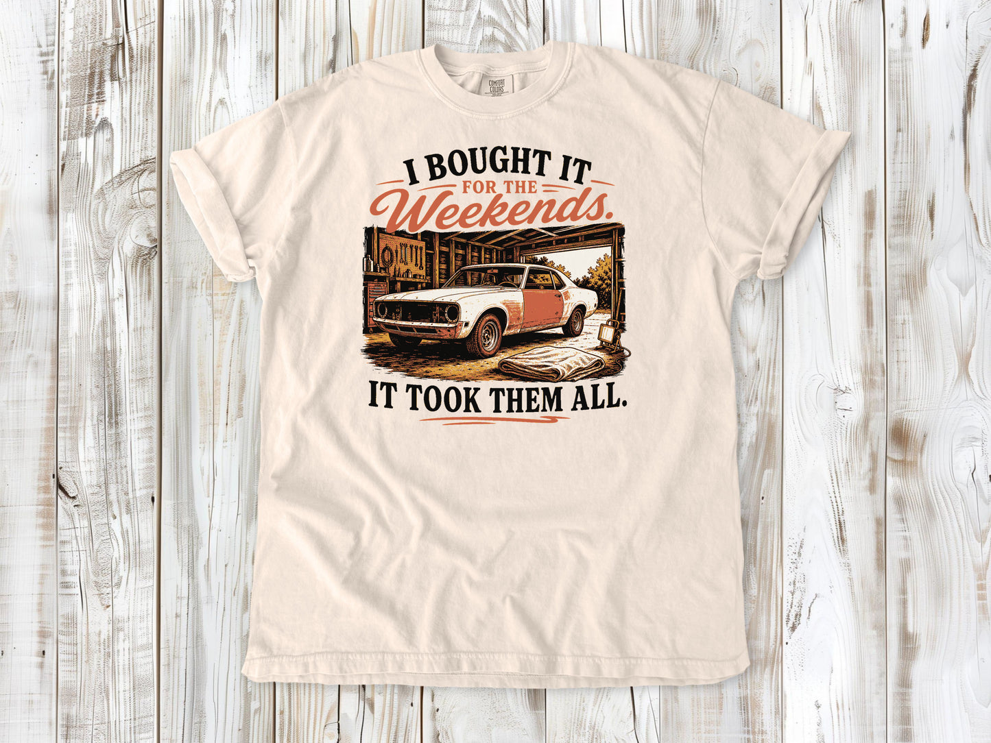 Ivory garment-dyed tee with I Bought It for the Weekends It Took Them All project car graphic.