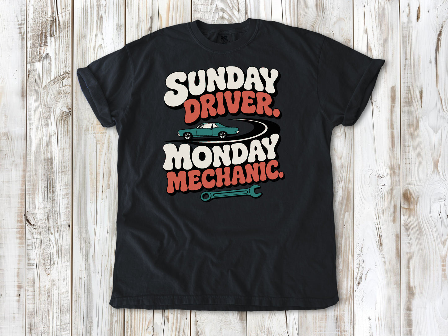 Graphite garment-dyed tee with Sunday Driver Monday Mechanic classic car graphic.