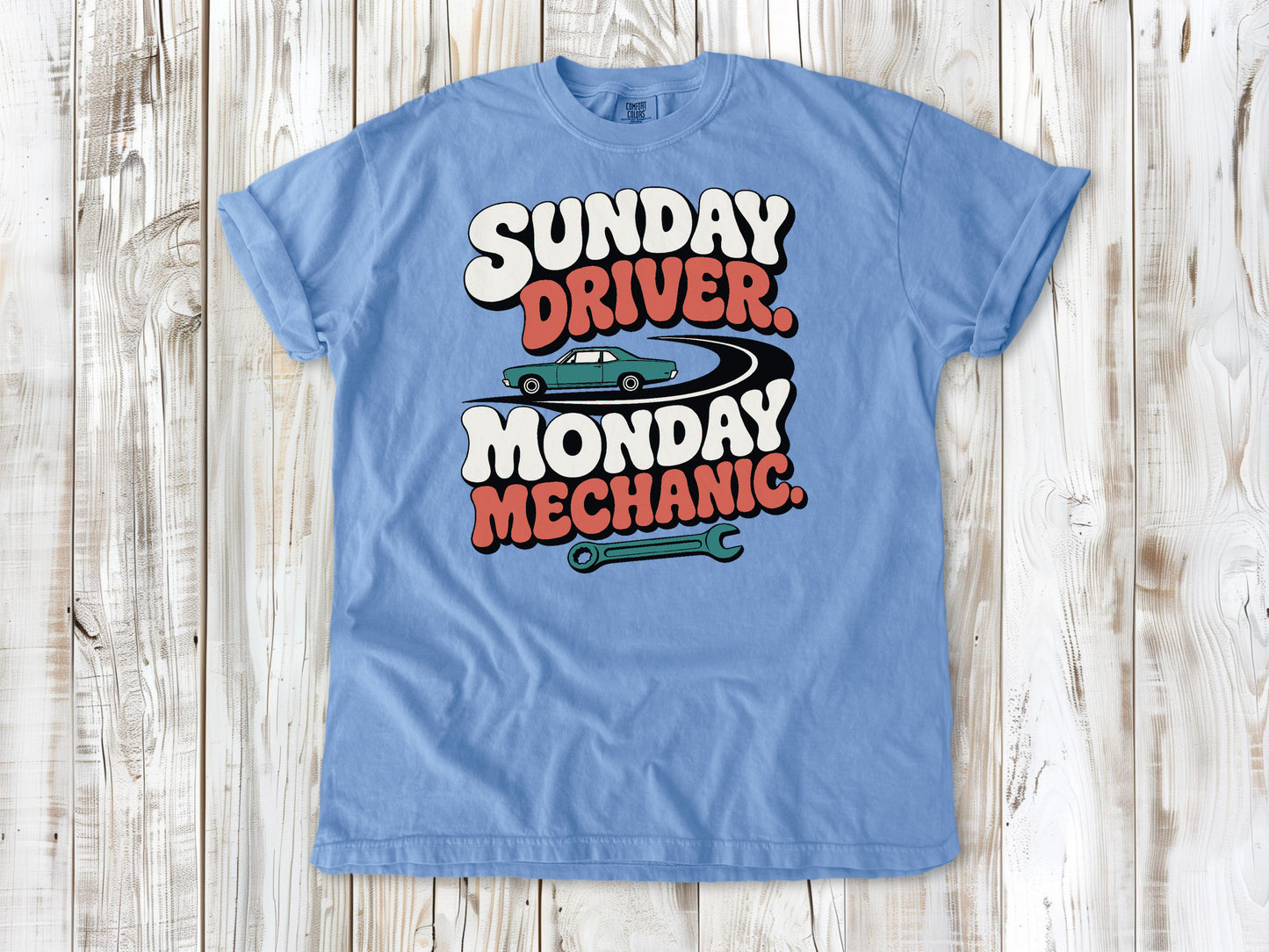 Washed Denim garment-dyed tee with Sunday Driver Monday Mechanic classic car graphic.