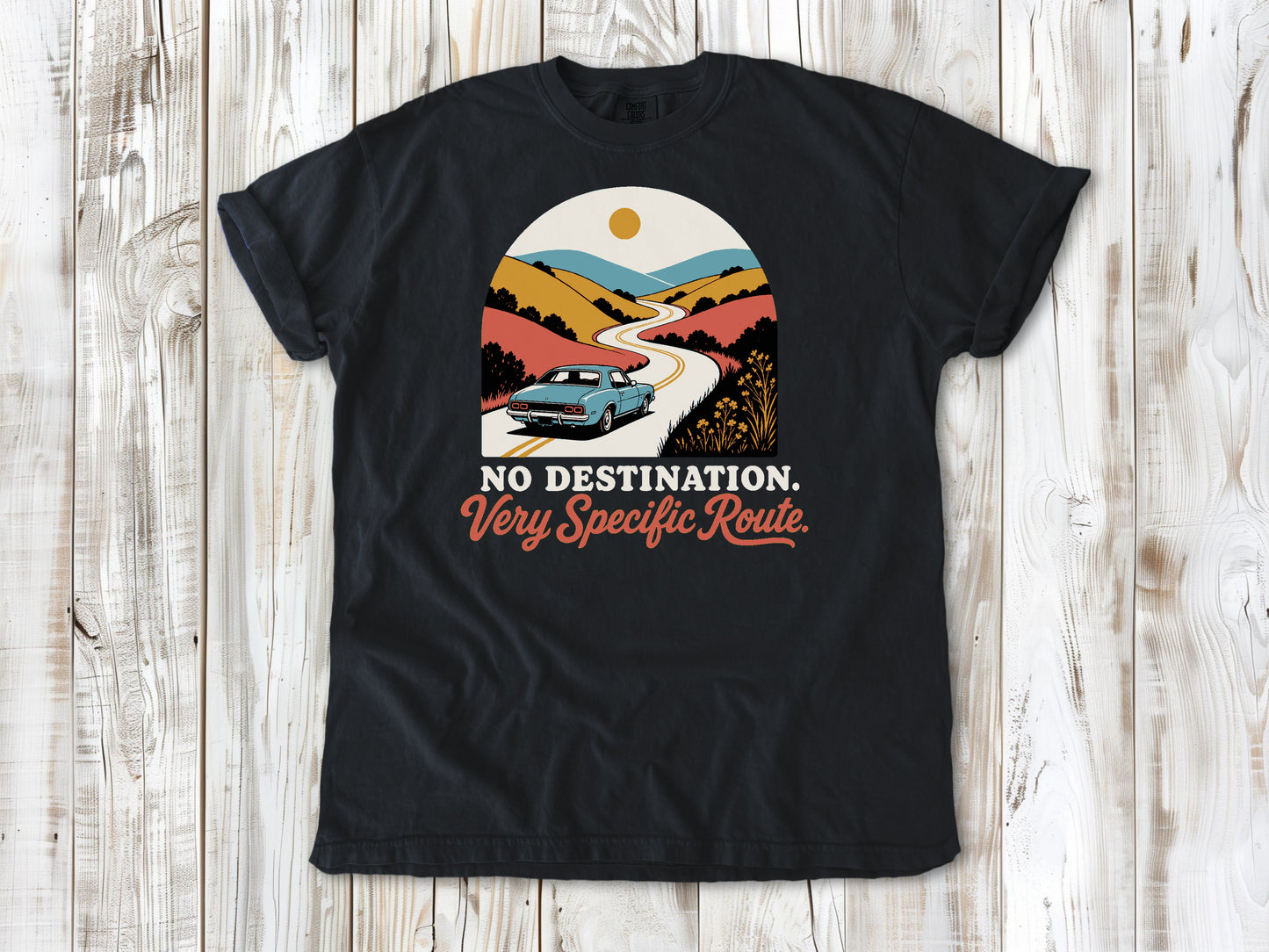 Graphite garment-dyed tee with No Destination Very Specific Route Sunday drive graphic.