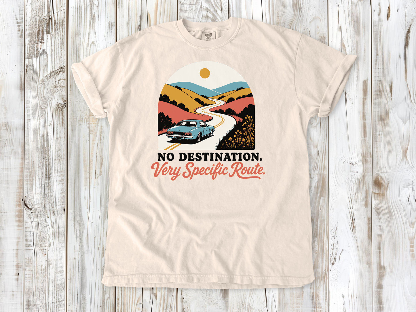 Ivory garment-dyed tee with No Destination Very Specific Route Sunday drive graphic.