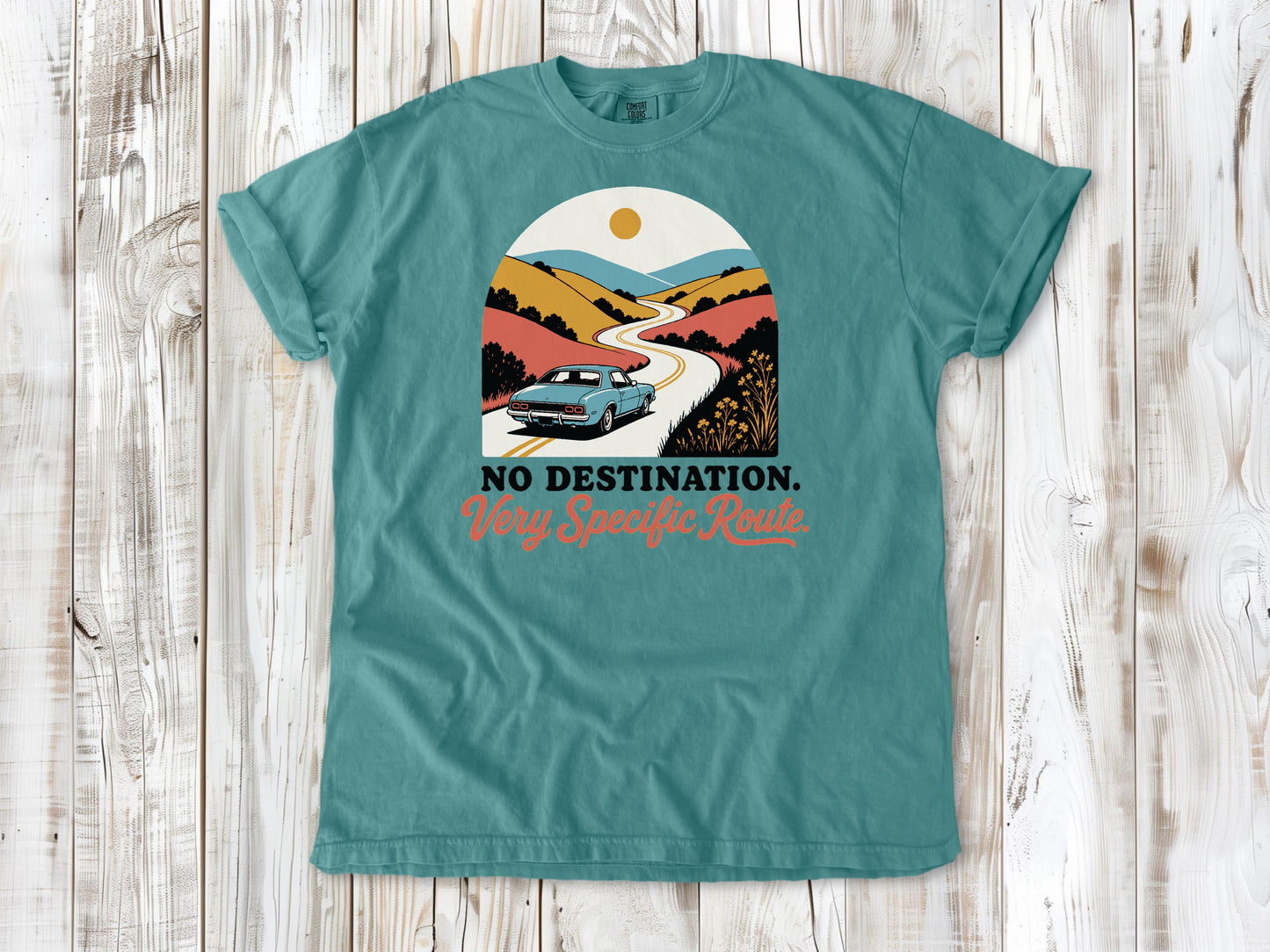 Seafoam garment-dyed tee with No Destination Very Specific Route Sunday drive graphic.