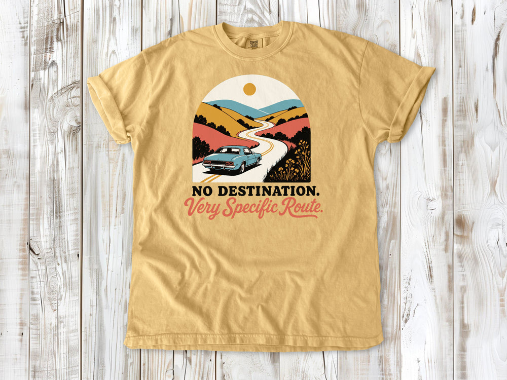 Mustard garment-dyed tee with No Destination Very Specific Route Sunday drive graphic.