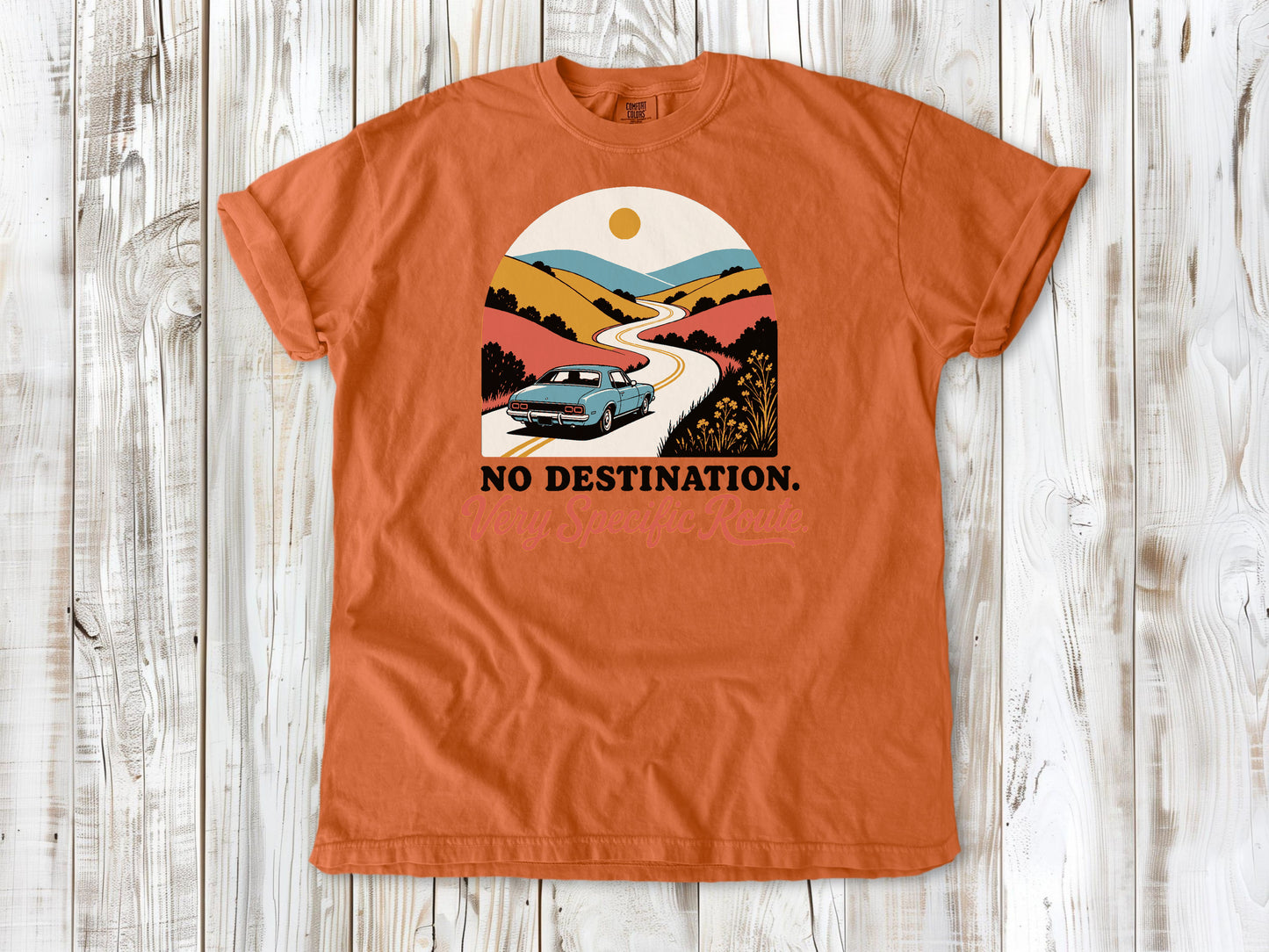 Burnt Orange garment-dyed tee with No Destination Very Specific Route Sunday drive graphic.