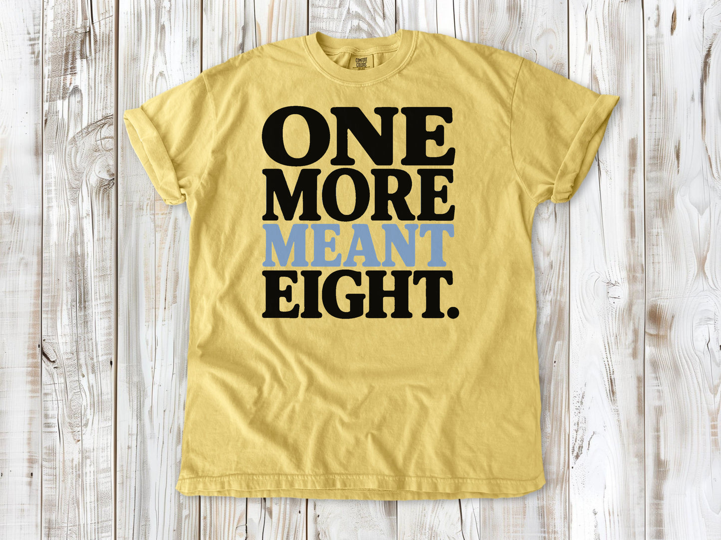 Butter garment-dyed tee with One More Meant Eight Pilates studio graphic.