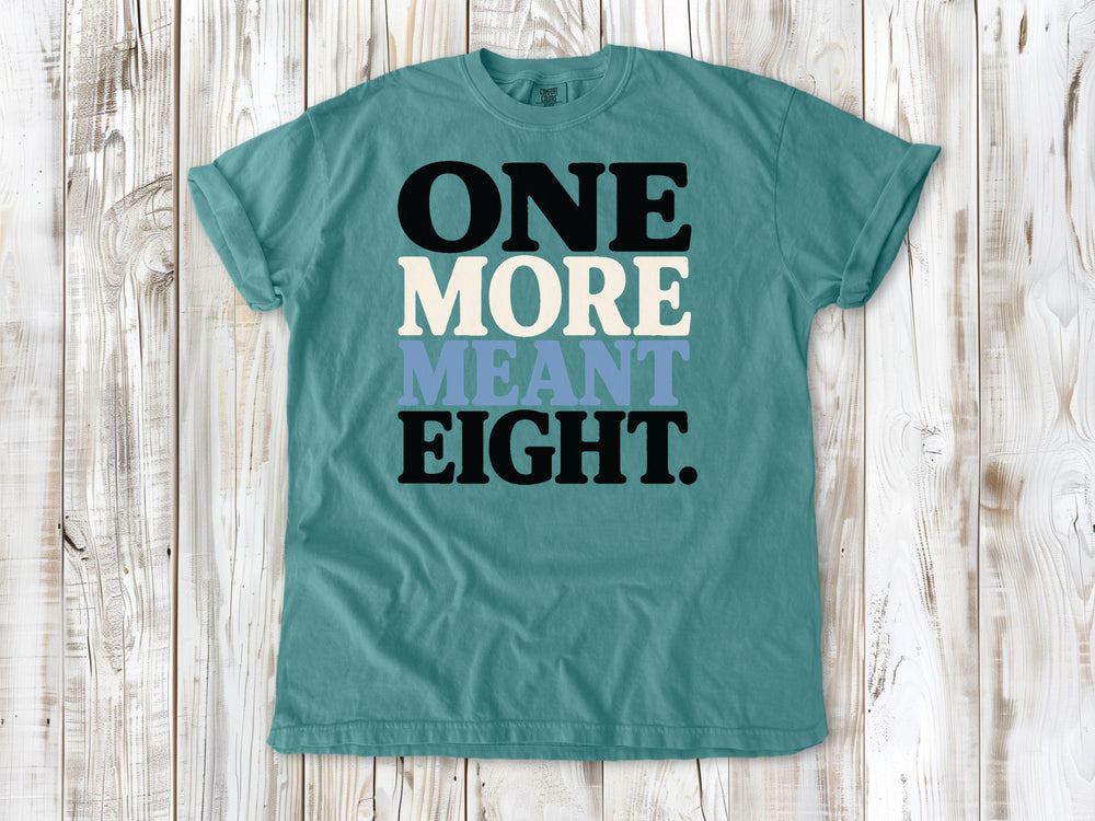 Seafoam garment-dyed tee with One More Meant Eight Pilates studio graphic.