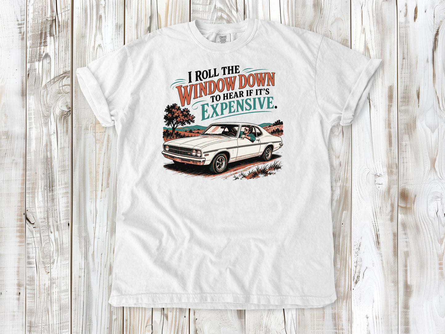 White garment-dyed tee with I Roll the Window Down to Hear If It Is Expensive car repair graphic.