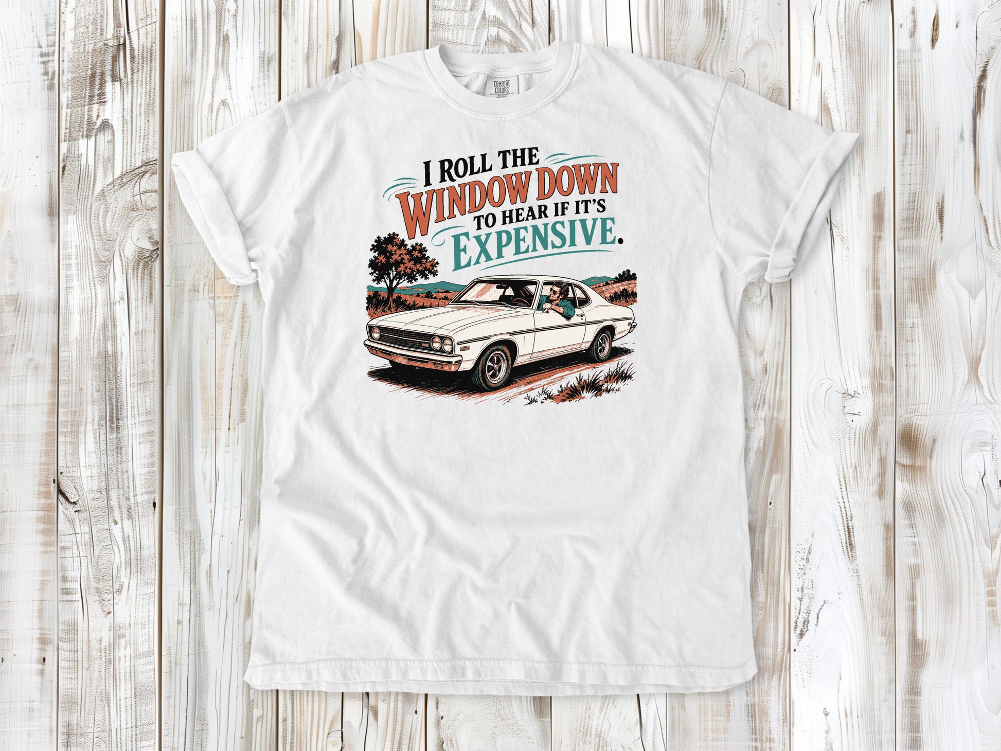 White garment-dyed tee with I Roll the Window Down to Hear If It Is Expensive car repair graphic.