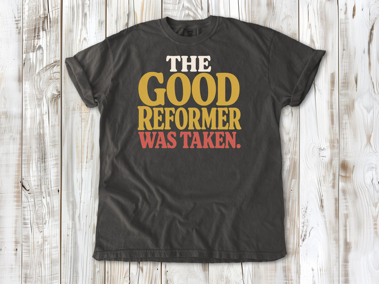 Pepper garment-dyed tee with The Good Reformer Was Taken Pilates studio graphic.
