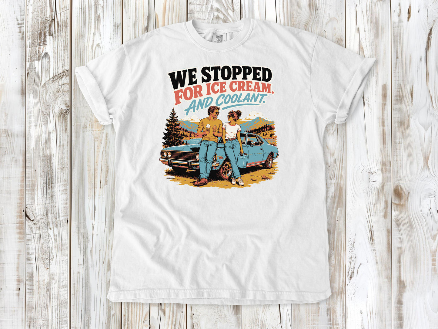 White garment-dyed tee with We Stopped for Ice Cream and Coolant road trip graphic.