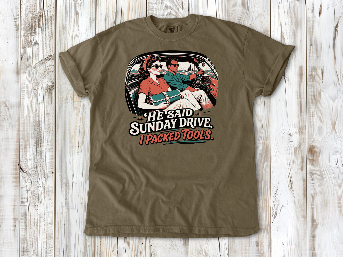 Khaki garment-dyed tee with He Said Sunday Drive I Packed Tools classic car graphic.